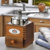 Handcrafted wooden coffee grinder featuring a top crank with wooden handle and polished steel burr mechanism, ideal for Farm, Garden & Tool, Kitchen & Food, Brewing Coffee and Tea, Best Sellers, Homesteading, and Promo Eligible collections.