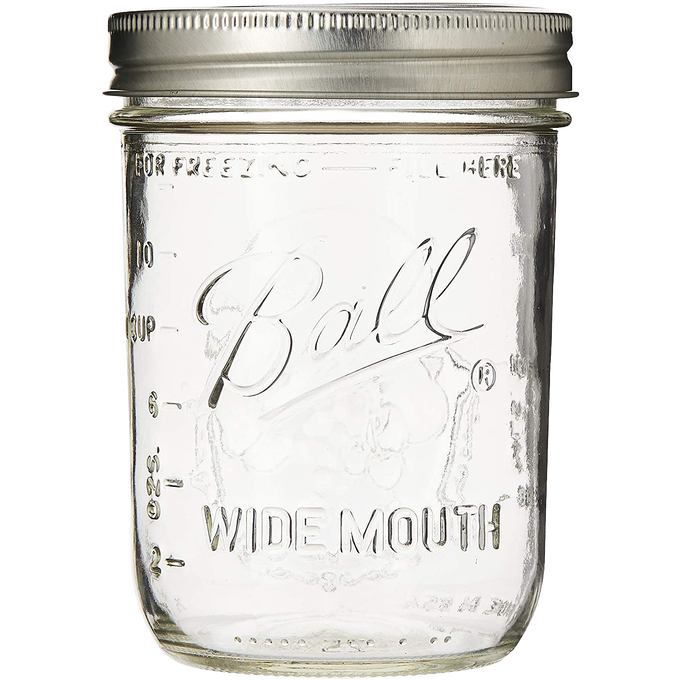 Clear handcrafted wide-mouth pint jar with metal lid, made in USA, suitable for Kitchen & Food, Food Preservation, Canning, and Canning Jars and Accessories collections.