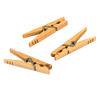 Three handcrafted maple spring clothespins with stainless steel springs, made in the USA, ideal for Home & Decor, Laundry Supplies, Clothesline Accessories, and Best Sellers collections.