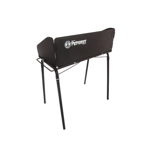 Sturdy black steel outdoor cooking table with foldable legs and side wind guards, designed for camping and farm use, perfect for Best Sellers and Promo Eligible collections.