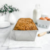 Large loaf with crumb topping baked in a sturdy recycled steel pan featuring corrugated texture for strength and even cooking, ideal for Kitchen & Food and Baking Supplies collections.