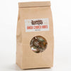 Brown paper bag of handcrafted Amish-made mints with a clear window showing individually wrapped candies, featured in Kitchen & Food, Snacks and Sweets, and USA Made collections.