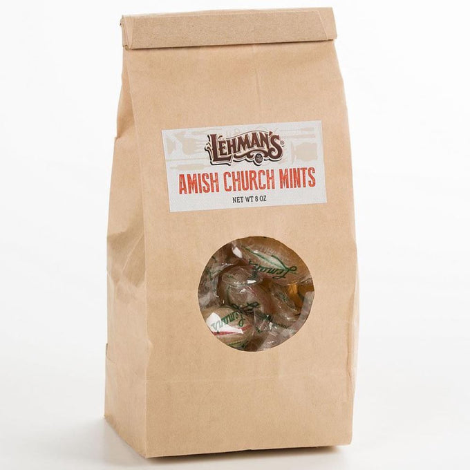 Brown paper bag of handcrafted Amish-made mints with a clear window showing individually wrapped candies, featured in Kitchen & Food, Snacks and Sweets, and USA Made collections.