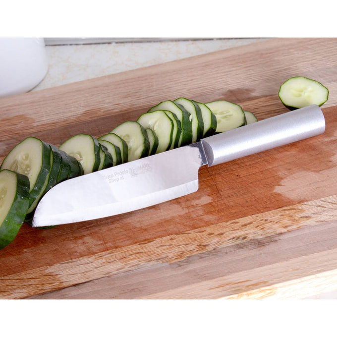 Handcrafted stainless steel utility knife with smooth metal handle slicing fresh cucumber on a wooden cutting board, featured in Kitchen & Food and Farm, Garden & Tool collections.