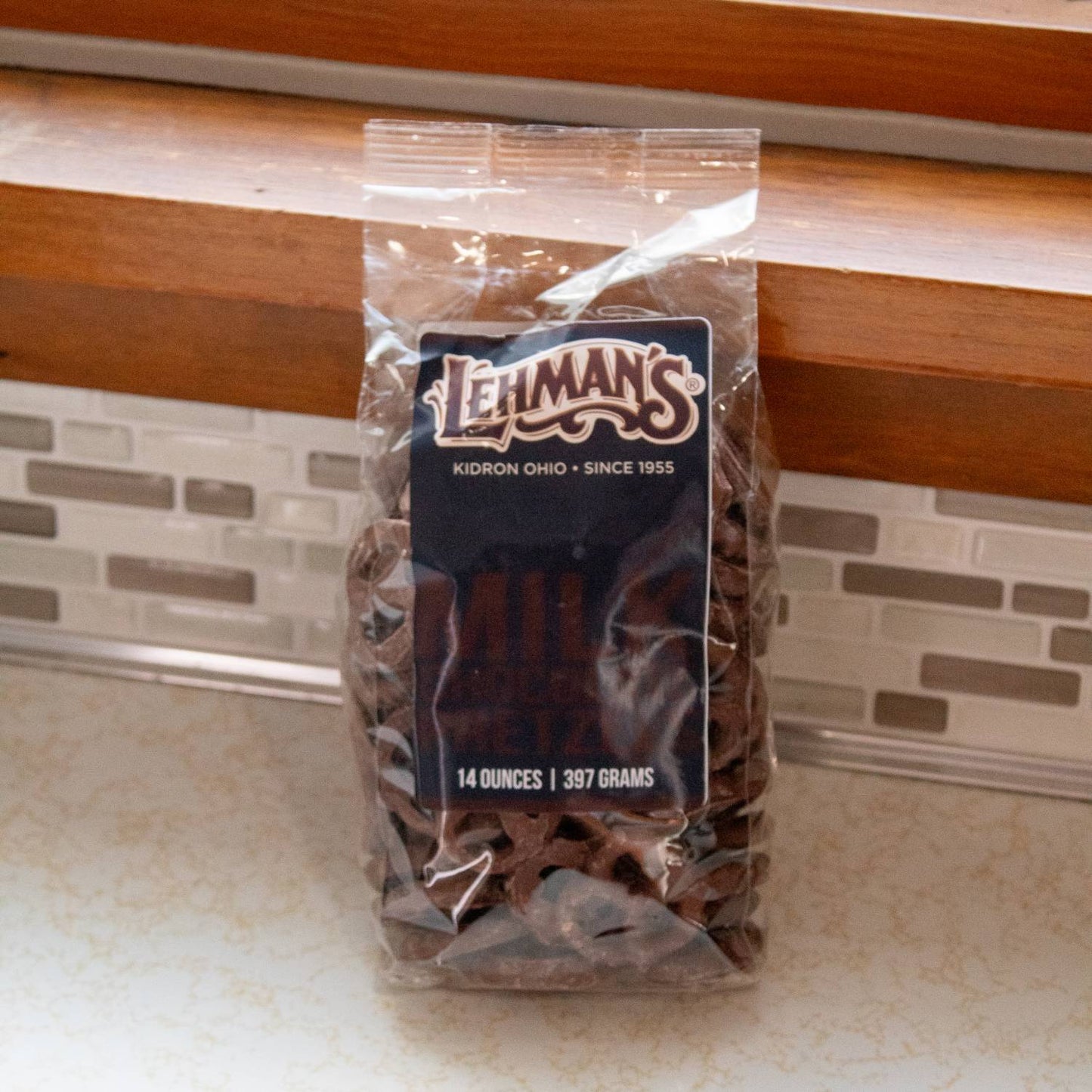 Clear resealable bag of handcrafted chocolate covered pretzels in dark chocolate, made in USA, a delicious snack ideal for Kitchen & Food, Snacks and Sweets, Candy, USA Made, Best Sellers, and Promo Eligible collections.