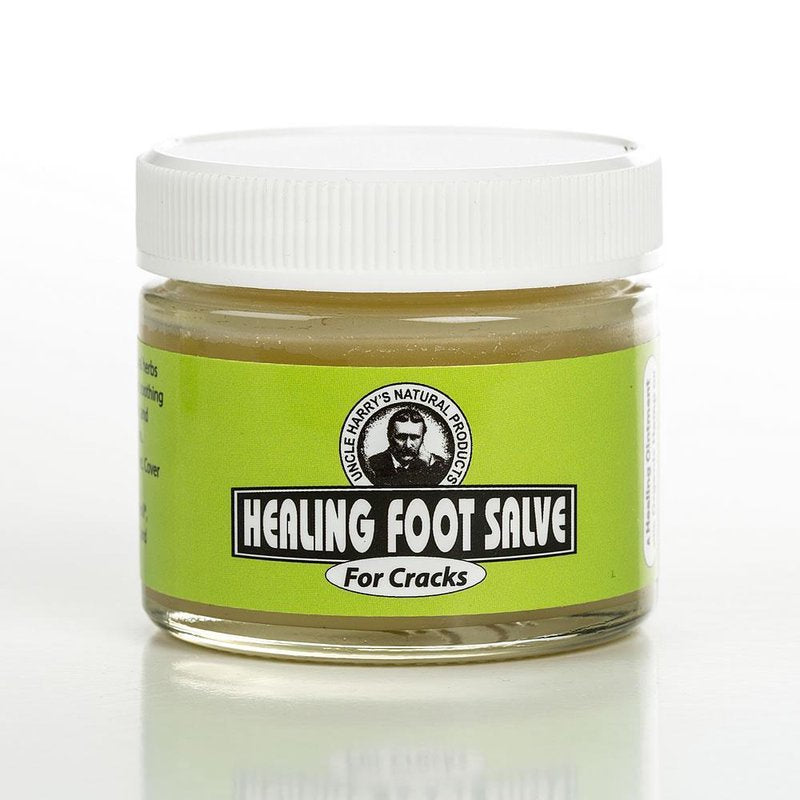 Small glass jar of Uncle Harry's Healing Foot Salve for Cracked Feet with a bright green label, containing a thick, natural balm in Health & Wellness and USA Made collections.