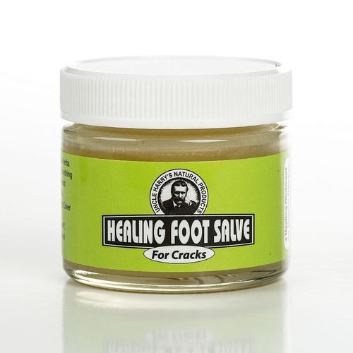 Small glass jar of Uncle Harry's Healing Foot Salve for Cracked Feet with a bright green label, containing a thick, natural balm in Health & Wellness and USA Made collections.