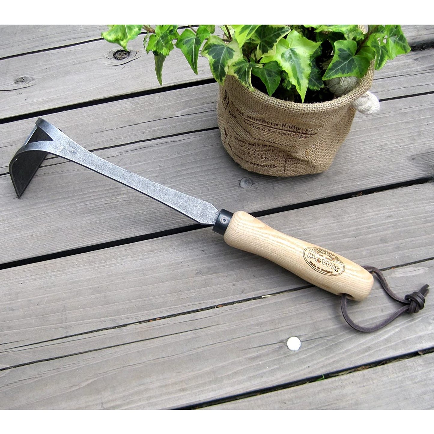 Handcrafted Bio Onion Hoe with a sharpened forged boron steel blade and smooth wooden handle, ideal for precise digging and cultivating in farm, garden, and tool collections.