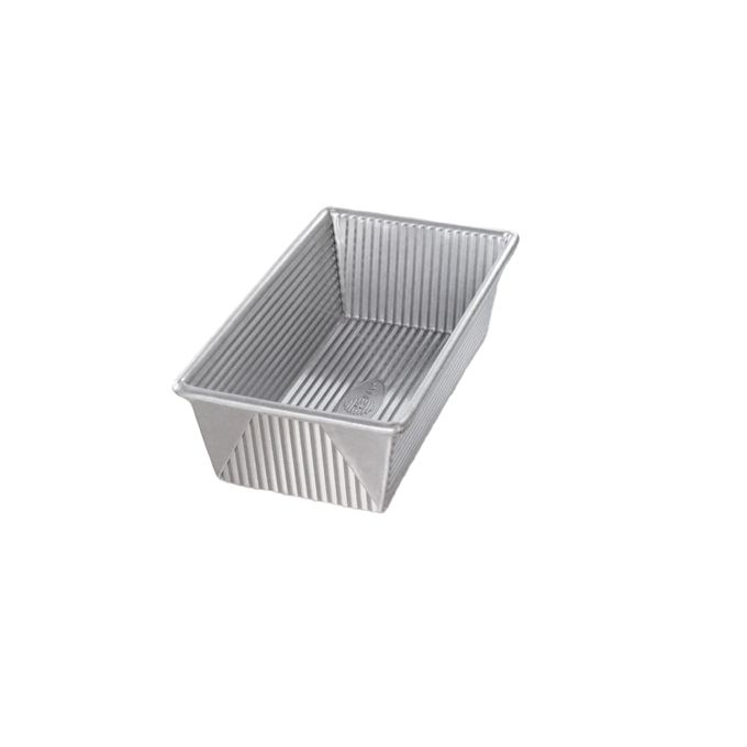 Corrugated nonstick aluminized steel bread loaf pan with unique air-circulating design, handcrafted in the USA and featured in Kitchen & Food, Cookware, and Baking Supplies collections.