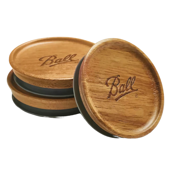 Set of three stackable wooden storage lids made from acacia wood with airtight seals, featuring engraved branding; ideal for kitchen storage and pantry organization in best sellers collections.