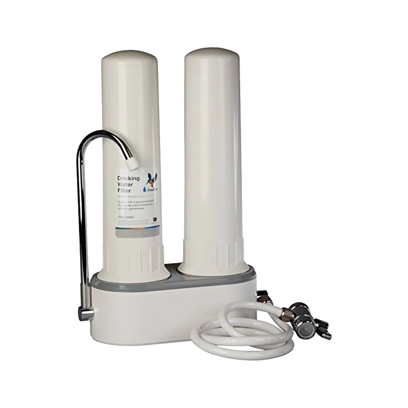 Compact white countertop water filtration system with two cylindrical chambers, chrome faucet attachment, and flexible hose, featured in Appliances and Emergency Supplies collections.