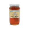 Clear glass jar of raw comb honey with visible honeycomb inside, featuring a beige label with rustic bee and hive illustration, made in USA, ideal for Kitchen & Food, Pantry, and Best Sellers collections.