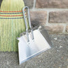 Lightweight rustproof aluminum dustpan with reinforced edges and hanging loops secured by oversized rivets, ideal for household cleaning, kitchen use, and Home & Decor collections.