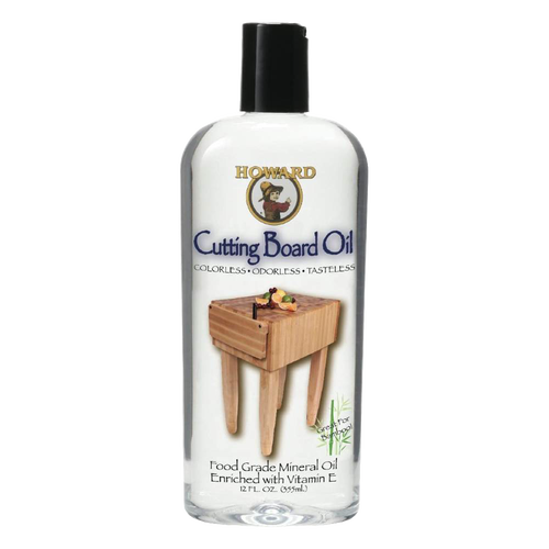 Clear bottle of food-grade mineral oil enriched with vitamin E for conditioning and maintaining wood surfaces such as cutting boards and butcher blocks, USA Made and ideal for Kitchen & Food and Food Prep collections.