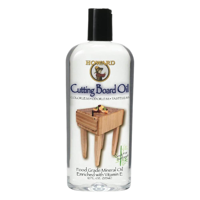 Clear bottle of food-grade mineral oil enriched with vitamin E for conditioning and maintaining wood surfaces such as cutting boards and butcher blocks, USA Made and ideal for Kitchen & Food and Food Prep collections.