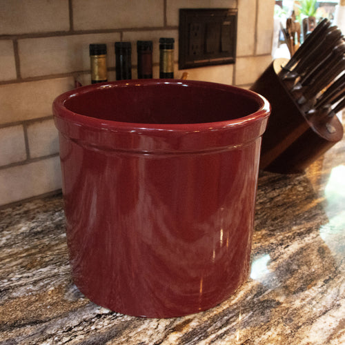 Handcrafted deep red stoneware crock with a smooth, lead-free food-safe glaze, ideal for fermenting and kitchen use, featured in Kitchen & Food, Food Preservation, and USA Made collections.