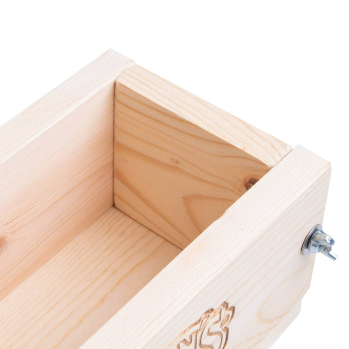 Close-up of a handcrafted wooden soap mold corner made from durable pine with a sturdy wingnut fastening, featured in Health & Wellness, Soaps and Soapmaking, and USA Made collections.