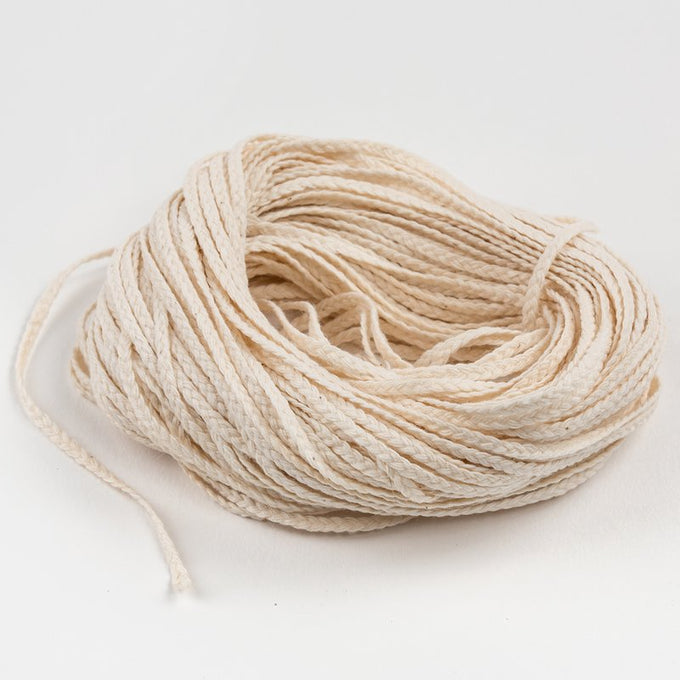 Natural flat-braid cotton wick bundle designed for candle crafting, ideal for use with pillar or taper candles, featured in Candlemaking Supplies, Lamps & Lighting, Best Sellers, and Promo Eligible collections.