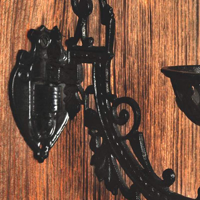 Cast iron wall bracket part with decorative scrollwork and large mounting plate, designed for Victorian-style oil lamps, handcrafted and suitable for Lamps & Lighting, Oil Lamps, Wall Lamps collections.