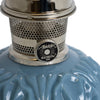 Close-up of a handcrafted limited edition oil lamp burner with perforated metal design and glossy Georgia Blue glass base, featured in Lamps & Lighting, Oil Lamps, Table Lamps, Best Sellers, and Promo Eligible collections.