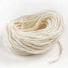 Coiled handmade square braided wick crafted for pillar or taper candles, suitable for use in lamps & lighting, candlemaking supplies, and best sellers collections.