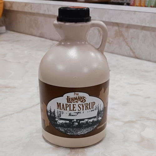 Handcrafted beige jug of medium amber maple syrup with vintage brown label showing a rustic sugar shack, ideal for Kitchen & Food, Pantry, USA Made, Best Sellers, and Promo Eligible collections.