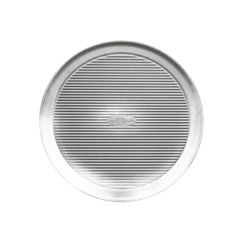 12-inch round aluminized steel pizza pan with fluted surface for even baking and crispy crusts, crafted in the USA, part of Kitchen & Food, Cookware, and Baking Supplies collections.
