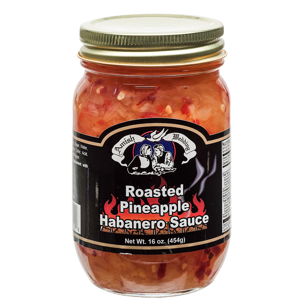 Glass jar of roasted pineapple habanero sauce with gold lid and black label featuring a traditional style logo, part of Kitchen & Food, Pantry, and USA Made collections.