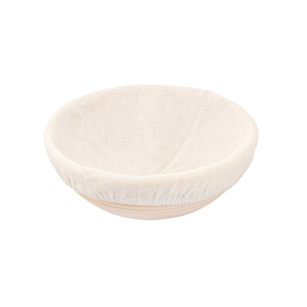 Handcrafted round rattan proofing basket with a removable cloth liner in natural tones, designed to support dough rising evenly, ideal for Kitchen & Food, Baking Supplies, and Bread Making collections.