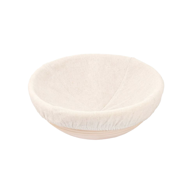 Handcrafted round rattan proofing basket with a removable cloth liner in natural tones, designed to support dough rising evenly, ideal for Kitchen & Food, Baking Supplies, and Bread Making collections.