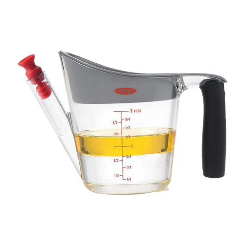Clear plastic fat separator with gray top and cushioned black grip handle, featuring red stopper and measurement markings, designed for Kitchen & Food, Cooking Helpers, and Best Sellers collections.