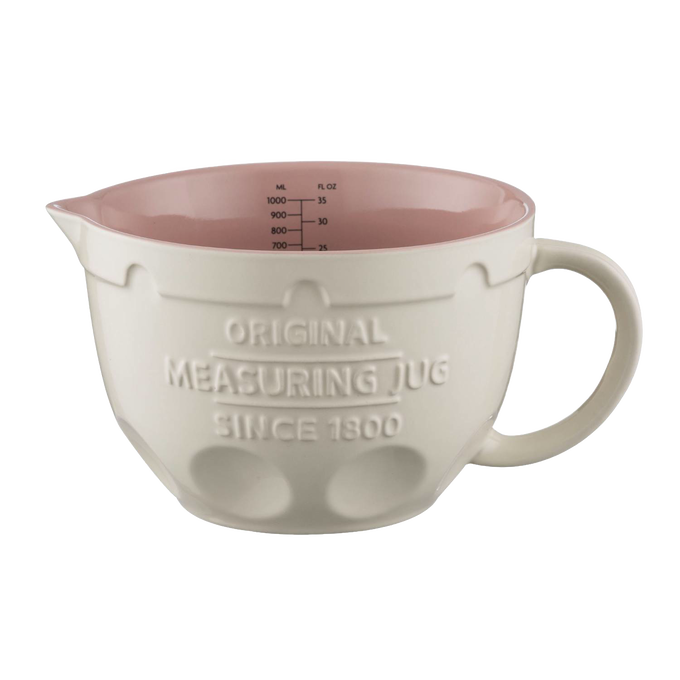 Cream-colored measuring jug with a soft pink interior, embossed with vintage lettering, designed for easy mixing and measuring in Kitchen & Food, Cookware, Baking Supplies, Food Prep, Measuring, Best Sellers, Promo Eligible collections.