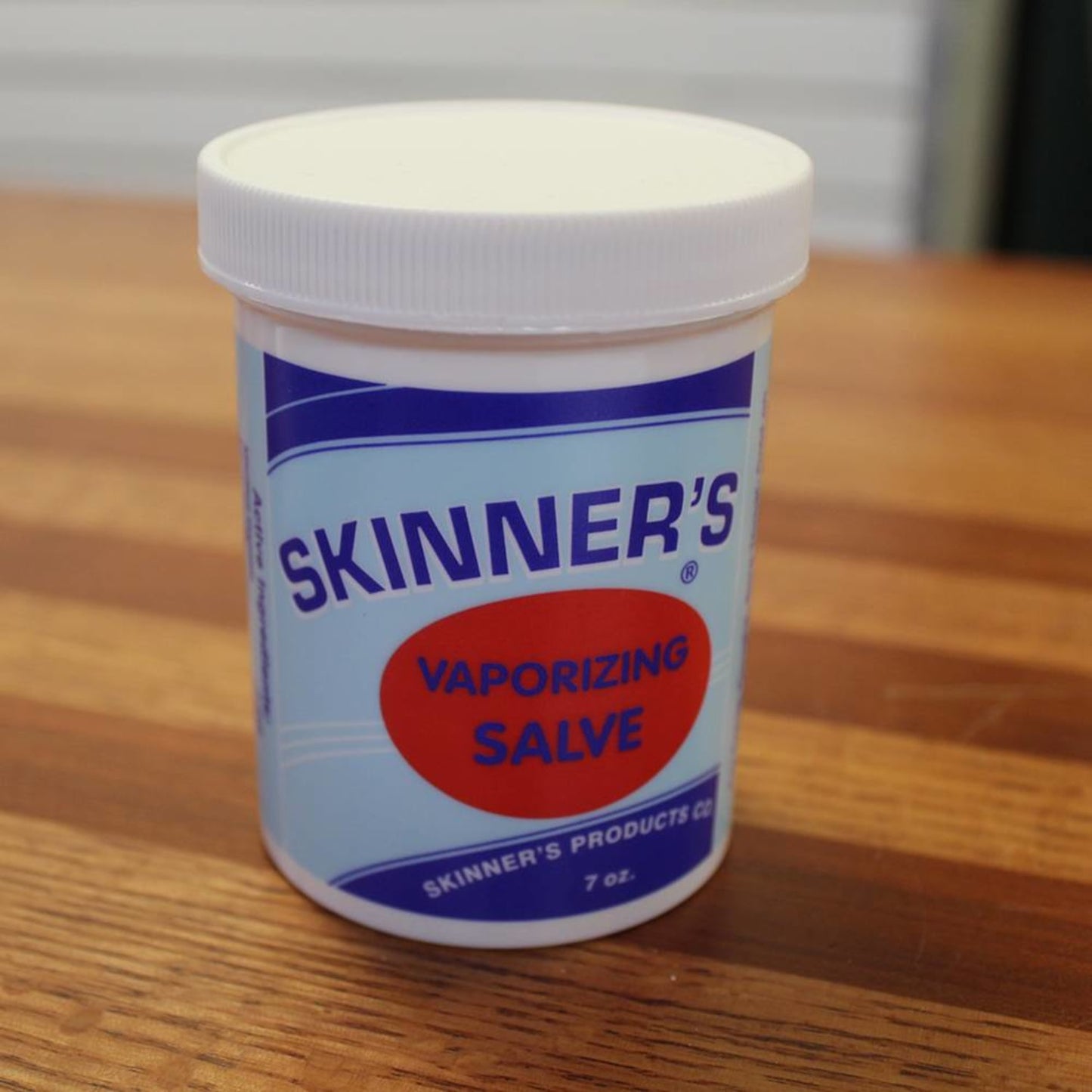 White plastic jar of vaporizing salve with bold blue and red labeling, made in USA, featured in Health & Wellness, Health Remedies, Best Sellers, and Promo Eligible collections.