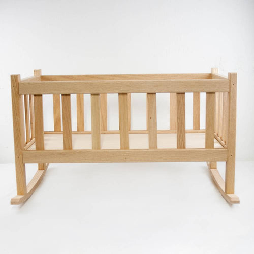 Handcrafted solid oak doll cradle with smooth finish and classic slatted design, made in the USA by Amish artisans for children's indoor play and doll accessories collections.