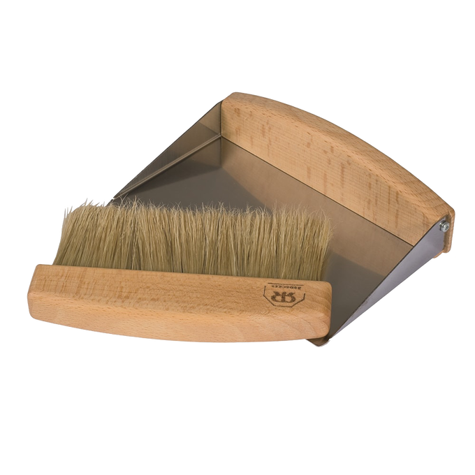 Magnetic brush and stainless steel dustpan with beechwood handles, designed for easy tabletop cleaning and storage, featured in Home & Decor and Household Cleaning collections.