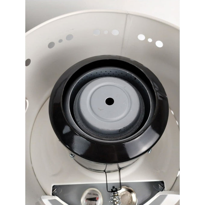 Top-down view of a compact portable kerosene cooker burner with fuel gauge and protective wind shield, designed for outdoor cooking and emergency use in farm, garden, and camping settings.