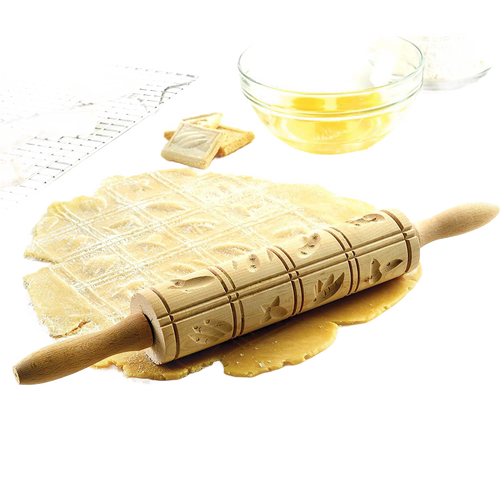 Wooden patterned rolling pin with traditional carved designs imprinting dough for Springerle cookies, shown with dough, baking rack with cookies, and glass bowls, ideal for Kitchen & Food, Cookware, Baking Supplies, Best Sellers, and Promo Eligible collections.