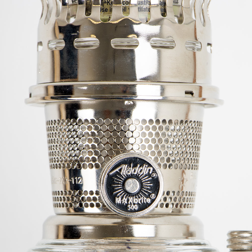 Close-up of a polished metal wick adjustment knob marked "Aladdin MaxBrite 500" on a handcrafted vintage-style oil lamp, perfect for Lamps & Lighting and Best Sellers collections.