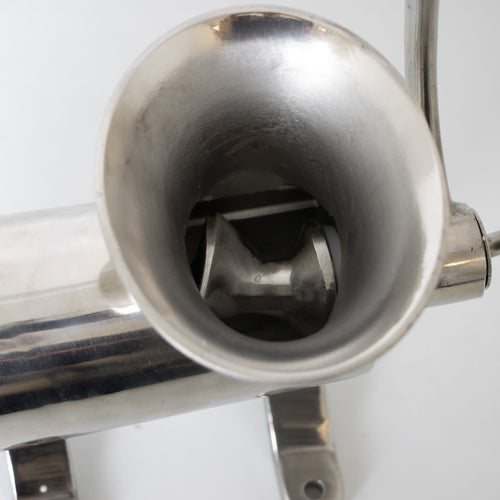 Close-up view inside the stainless steel meat grinder hopper showing the spiral auger, handcrafted and featured in Kitchen & Food, Specialty Equipment, Butchering Supplies, and Best Sellers collections.