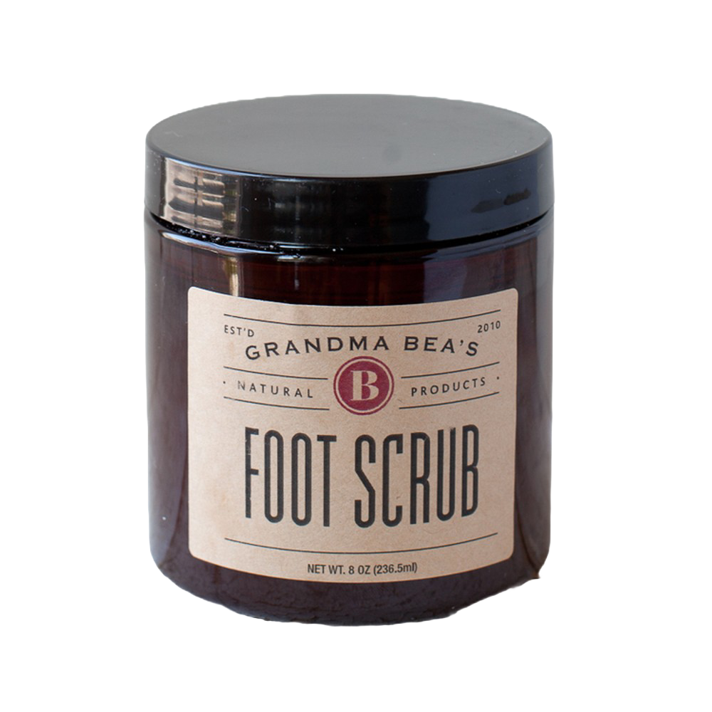 Amber glass jar of handcrafted foot scrub with a simple beige label, made in USA, ideal for Health & Wellness, Balms, Creams and Lotions, and Best Sellers collections.