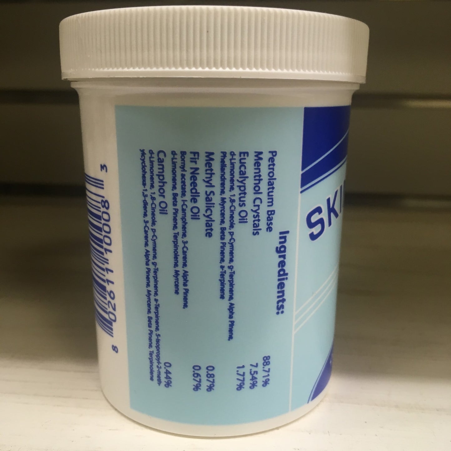 White plastic jar showing ingredient list for Skinner's Vaporizing Salve with menthol crystals, eucalyptus oil, camphor oil, and other natural extracts, featured in Health & Wellness and USA Made collections.