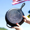 Handcrafted cast iron skillet with an embossed American flag and "Made in America" text, showcasing durable USA made cookware, perfect for Kitchen & Food and Cast Iron collections.