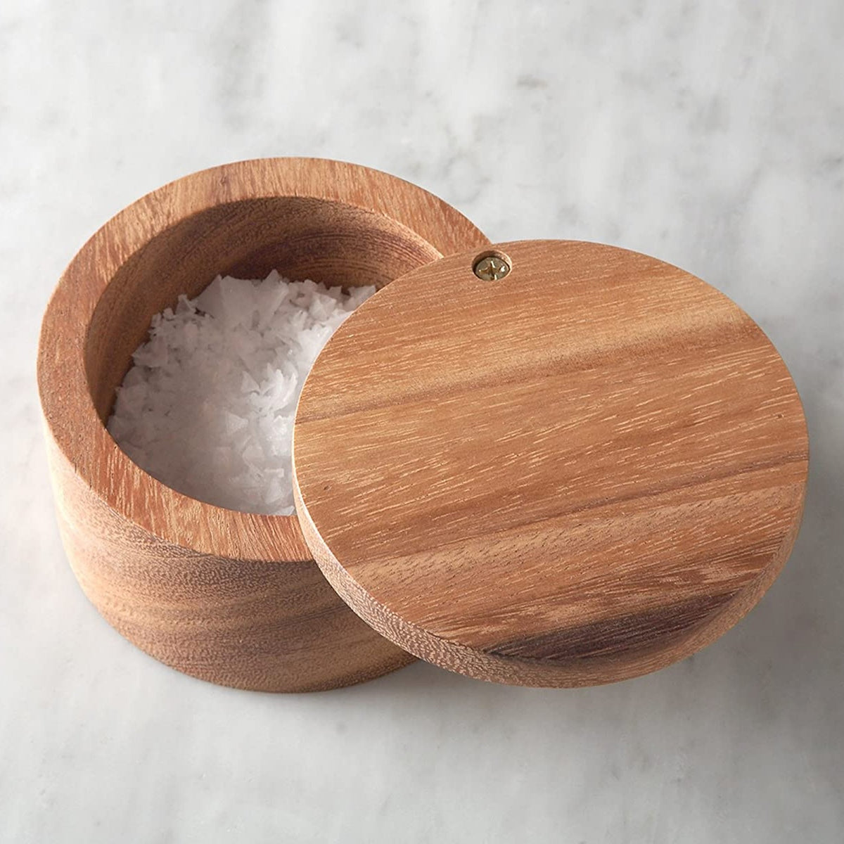 Handcrafted acacia wood salt cellar with a swivel lid, filled with coarse salt flakes, perfect for Kitchen & Food, Storage and Serving, Best Sellers, and Promo Eligible collections.