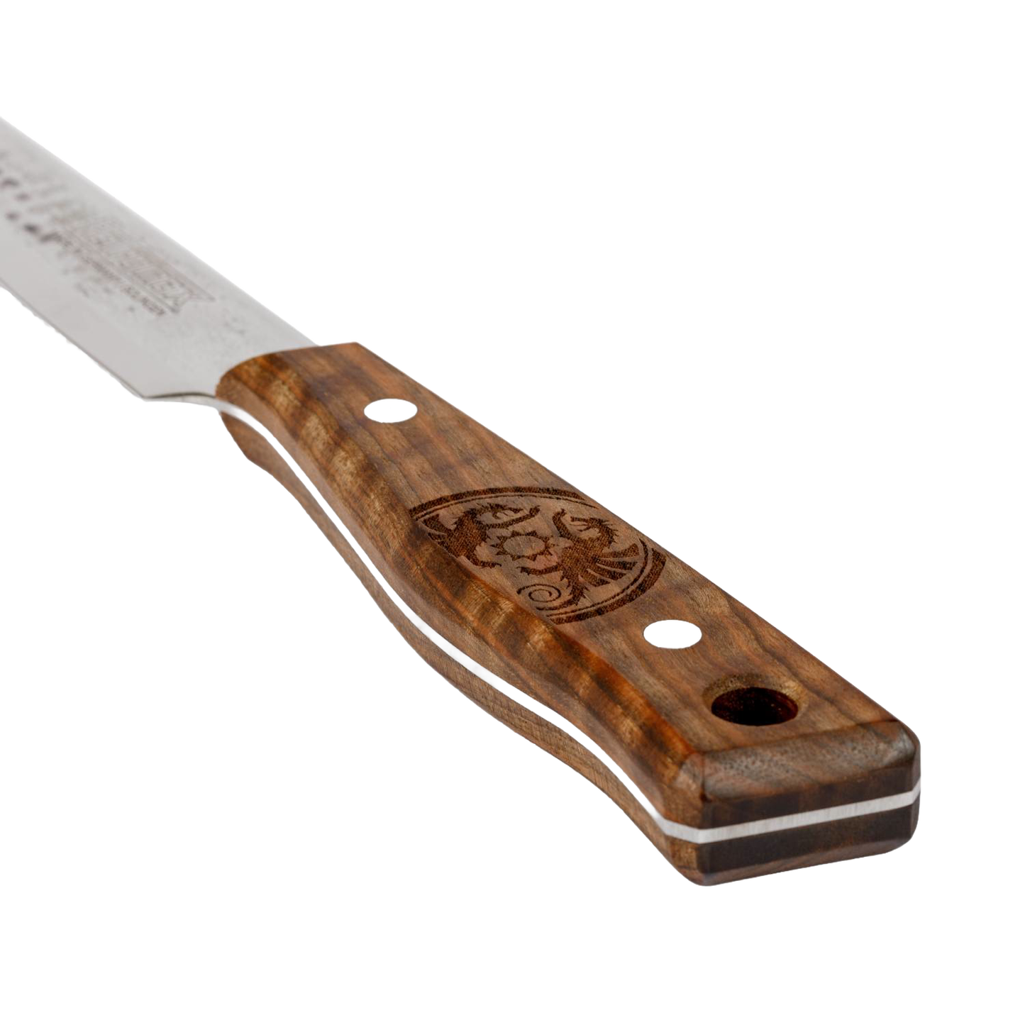Close-up of a handcrafted utility knife handle made of polished walnut wood with decorative engraving, designed for outdoor cooking and included in camping and kitchen collections.