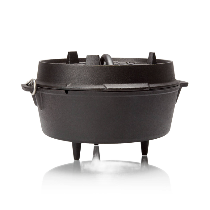 Robust cast iron Dutch oven with three tall legs and a fitted lid featuring a sturdy handle, designed for reliable outdoor and indoor cooking in Kitchen & Food, Cookware, Cast Iron collections.