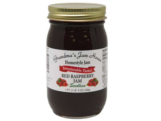 Handcrafted jar of seedless red raspberry jam with gold lid and label featuring raspberry illustrations and "Irresistable Taste," made in USA, ideal for Kitchen & Food, Pantry, Peanut Butter & Jellies, Best Sellers, and Promo Eligible collections.