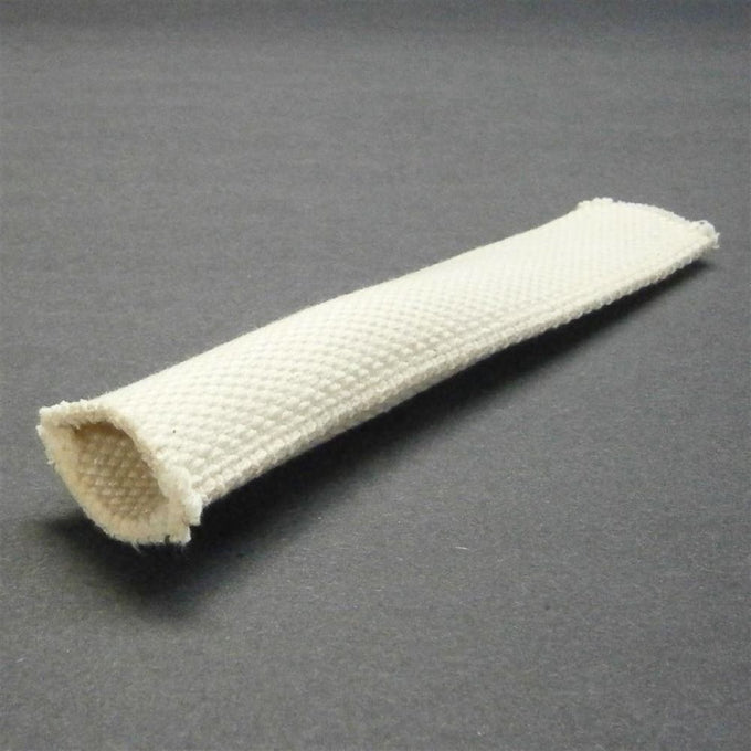 Close-up of a handcrafted tubular wick designed for oil lamps, showcasing its textured fabric construction, perfect for Lamps & Lighting, Parts and Accessories, and Wicks and Mantles collections.
