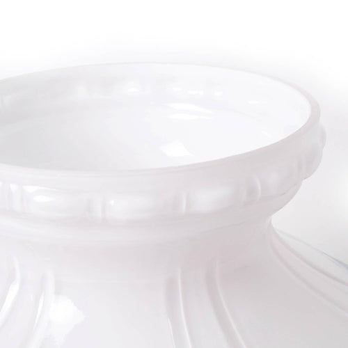 Close-up of a glossy white glass lamp shade with embossed detailing, designed to soften and distribute light, featured in Lamps & Lighting and Lamp Shades collections.
