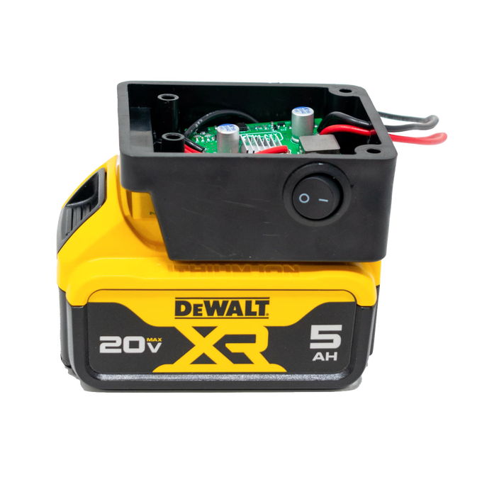 Black plastic battery light adapter housing with internal circuit board and wiring, including a power switch, shown mounted on a yellow DeWalt 20V XR 5Ah battery, ideal for Lamps & Lighting, Battery, Solar, LED, and Best Sellers collections.