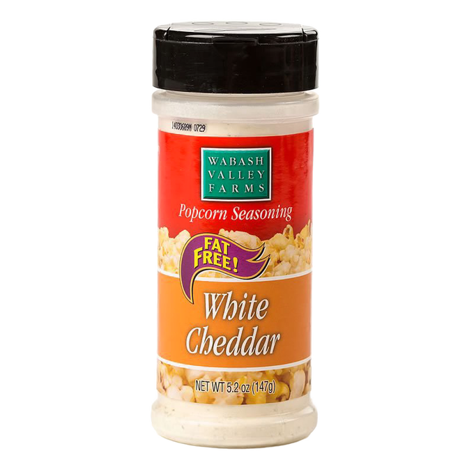 Clear plastic shaker bottle of fat-free white cheddar popcorn seasoning with orange and red label, made in USA, featured in Kitchen & Food, Snacks and Sweets, Popcorn collections.